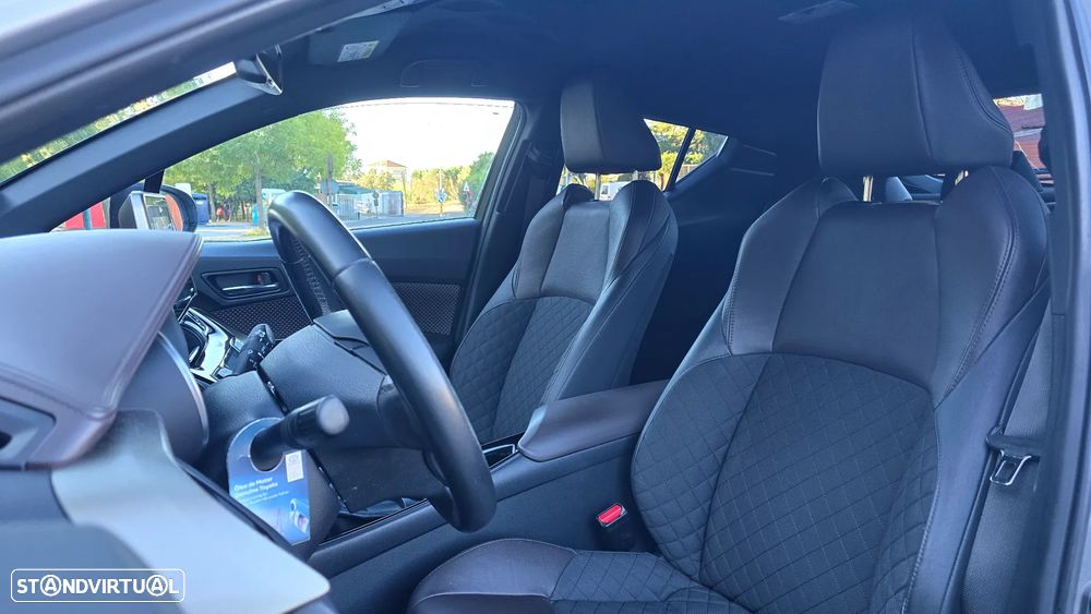 Toyota C-HR 1.8 HSD Exclusive+P.Luxury - 32