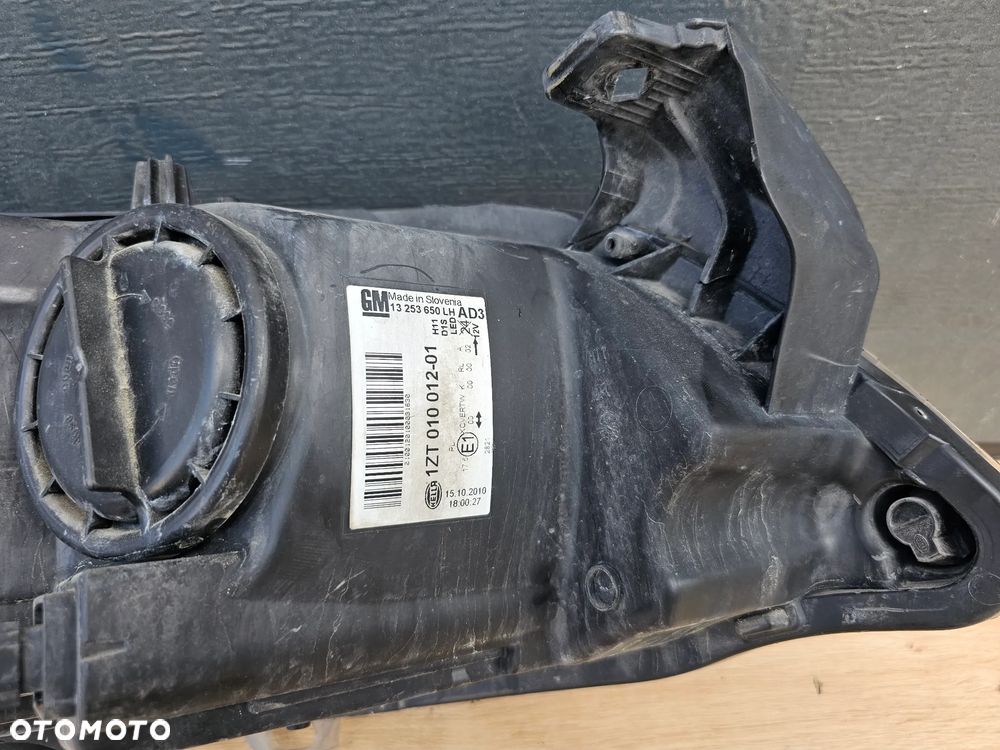 LAMPA LEWA PRZEDNIA LEWY PRZÓD OPEL ASTRA J BI-XENON EUROPA DEMONTAŻ ORYGINAŁ PRZED LIFT PO LIFT 13253650 - 17