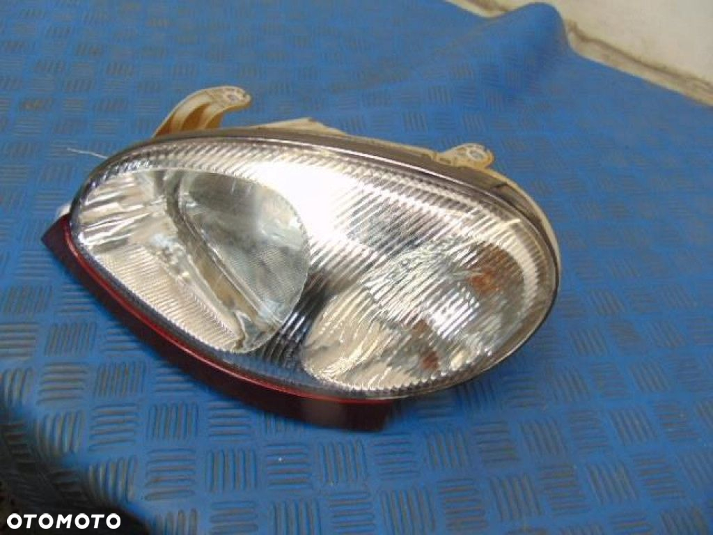 DAEWOO LANOS SEDAN REFLEKTOR LEWY - 2