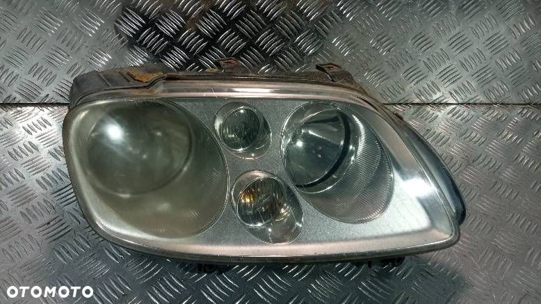 LAMPA PRAWA PRZEDNIA VOLKSWAGEN TOURAN - 1