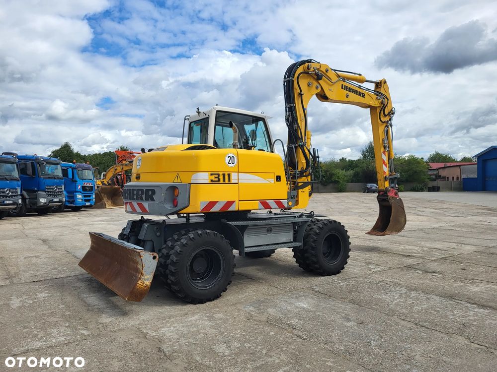 Liebherr A 311 spr z Niemiec - 2