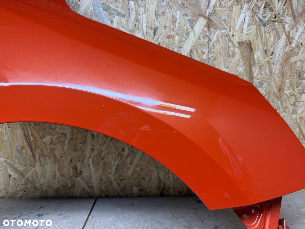 BŁOTNIK PRZÓD PRAWY PRZEDNI PRAWY OPEL CORSA F POMARAŃCZOWY - 18