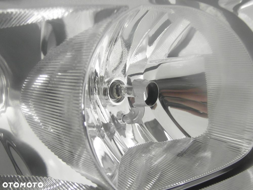 LAMPA PRAWA PRZEDNIA RENAULT SCENIC II 15810400RE - 2