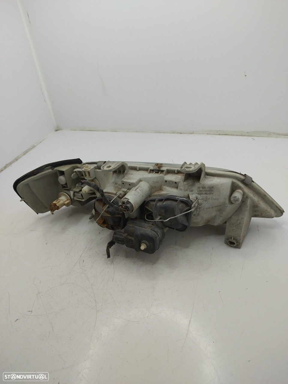 Farol/ Otica Dianteiro Esq Nissan Primera (P11) - 4