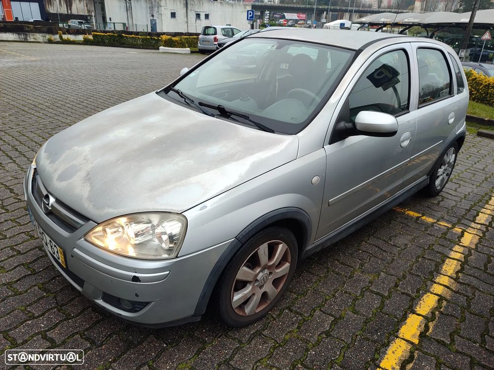 Opel Corsa 1.2 Enjoy - 1