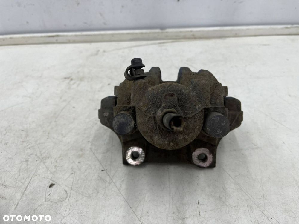 Zacisk hamulcowy BMW E81 E82 X1 E84 E90 E91 E92 E93 lewy tylny jarzmo lewy tył na tarcze 300 mm. - 5