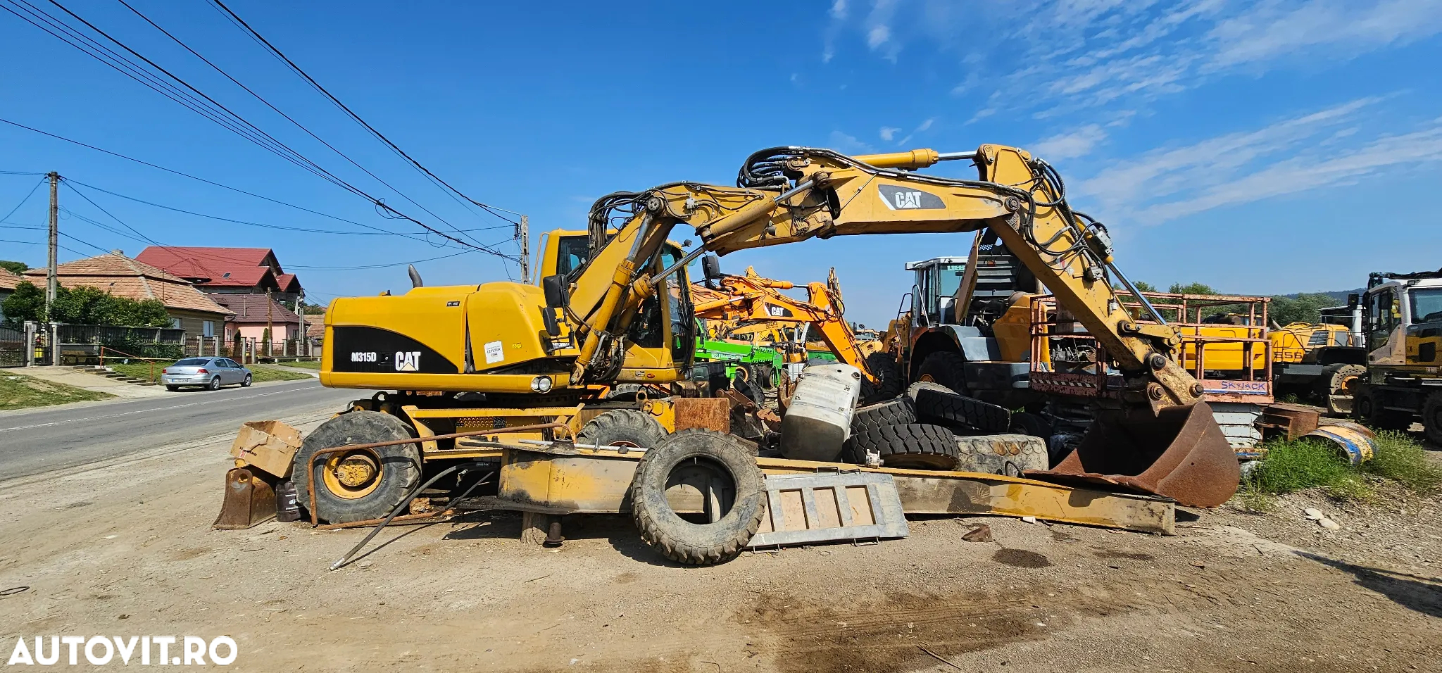 Caterpillar CAT M 315 D Excavator pe roti - 9