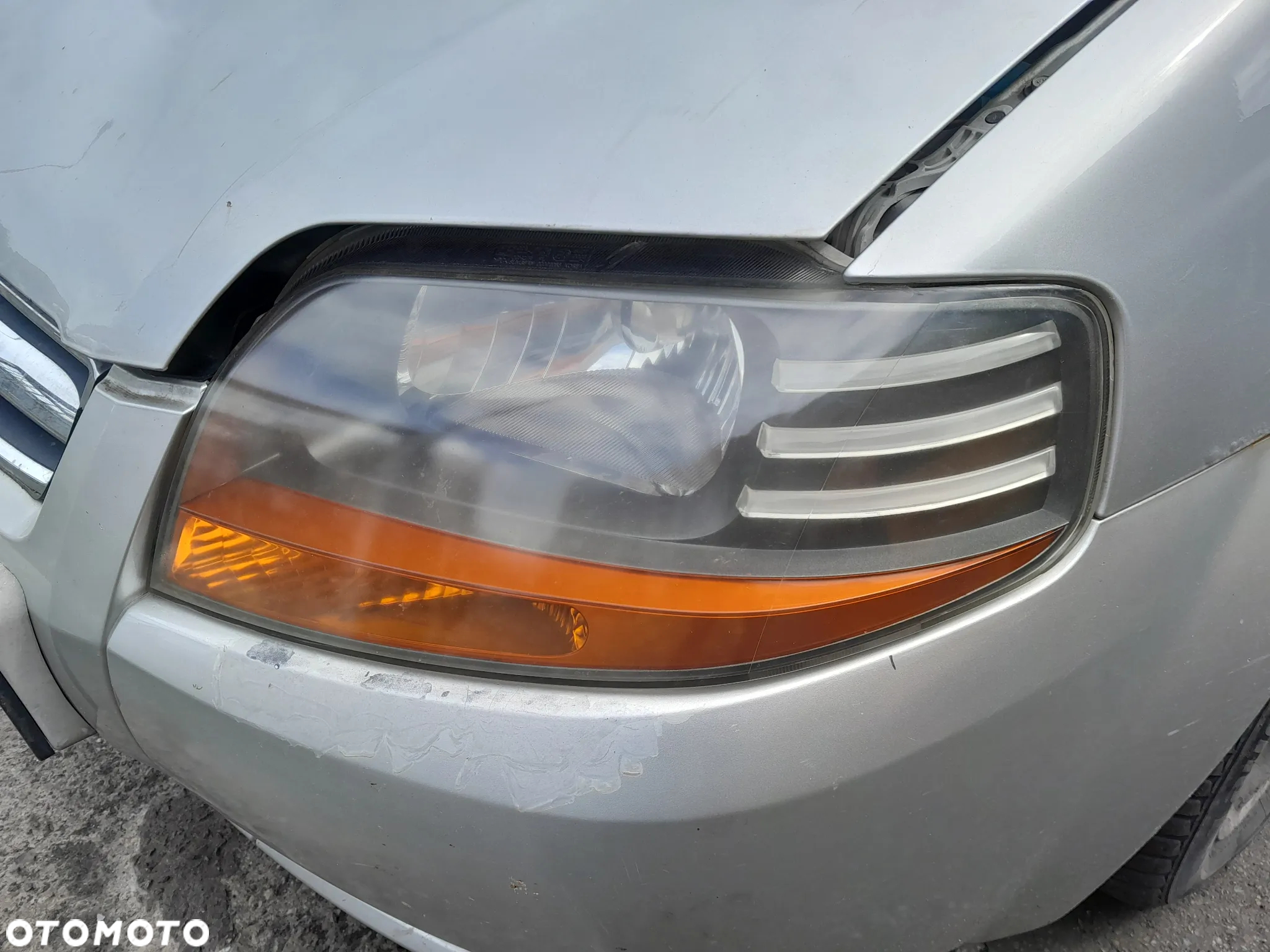 Lampa przednia lewa Daewoo Kalos lift 02-04r. - 2