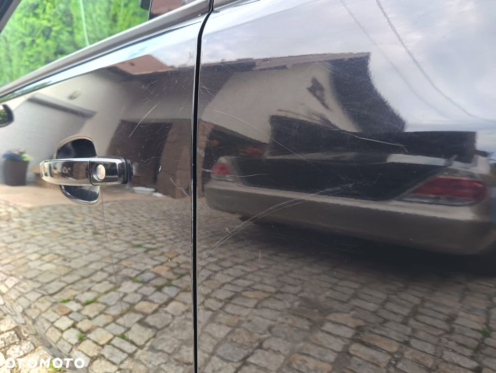 Opel Corsa 1.4 16V Essentia - 18