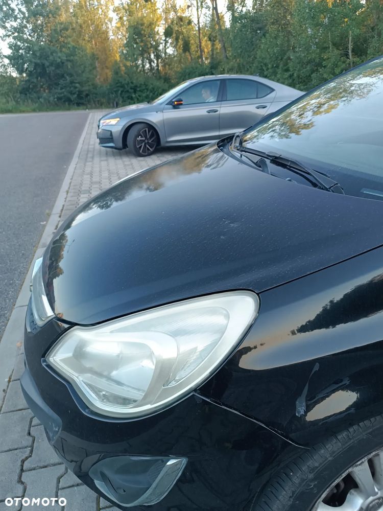 Opel Corsa 1.4 16V Cosmo - 8