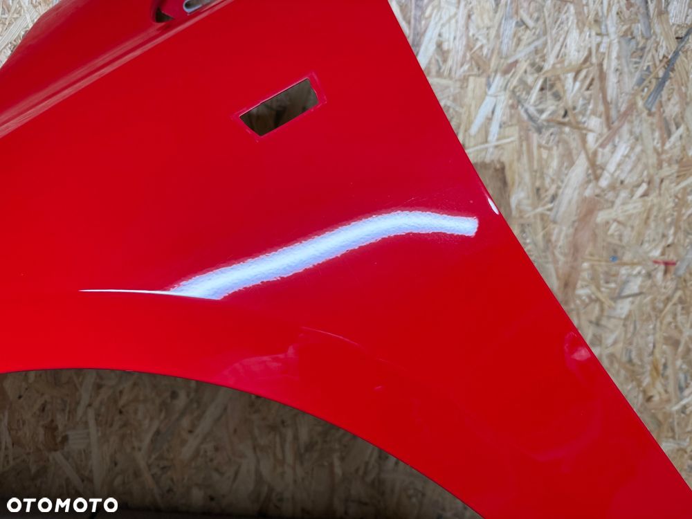 BŁOTNIK LEWY PRZÓD LEWY PRZEDNI OPEL CORSA E CZERWONY 50B - 25