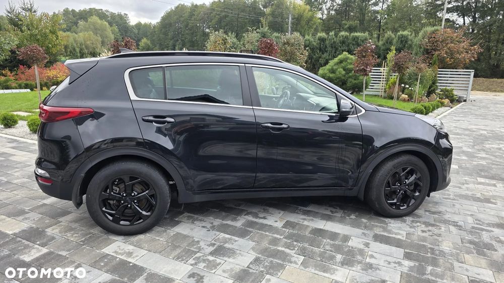 Kia Sportage - 4