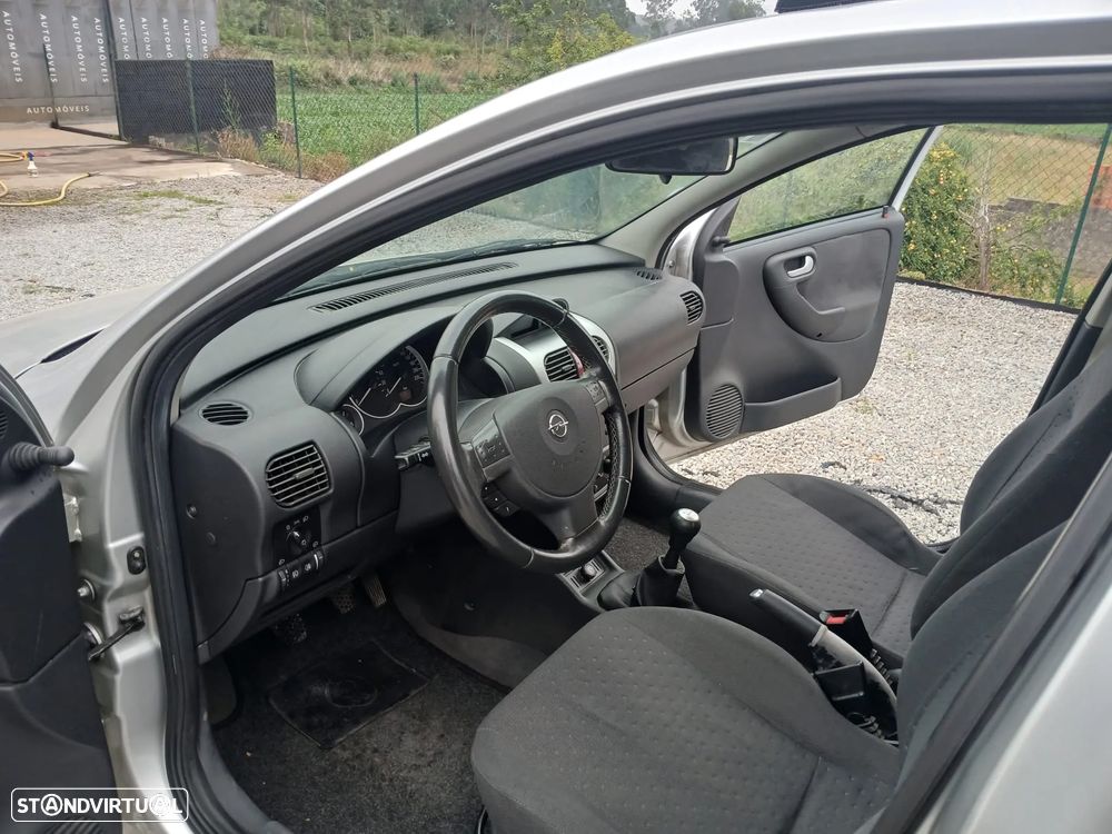 Opel Corsa 1.2 16V Cosmo - 11