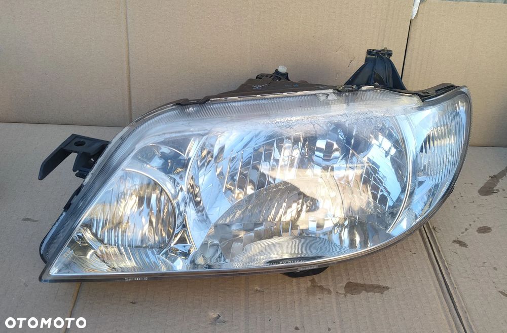 Reflektor lewy Lampa lewa Mazda 323F 323 F 2001- Jasna EU