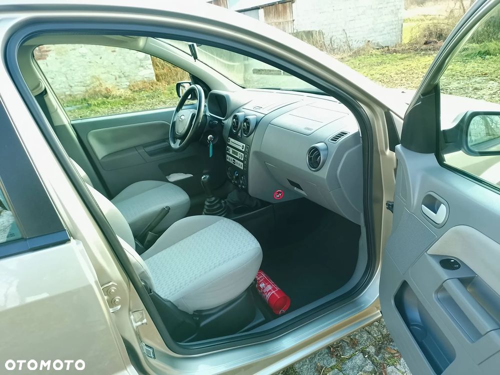 Ford Fusion 1.4 + - 11