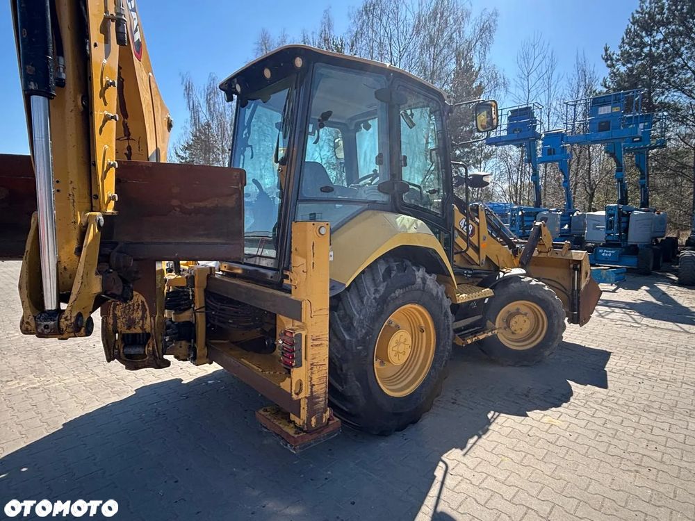 Caterpillar 428 - 11