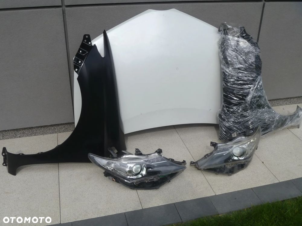 TOYOTA AURIS II BŁOTNIK PRAWY LEWY NOWY - 2