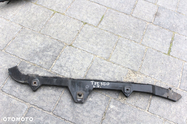 ŚLIZG ZDERZAKA LEWY TYŁ AVENSIS T25 SEDAN 52576-05030
