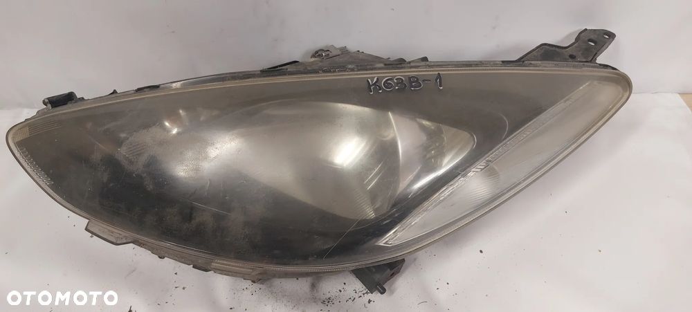 .  PRZOD PRZEDNIA LAMPA LEWA MAZDA 2 - 1