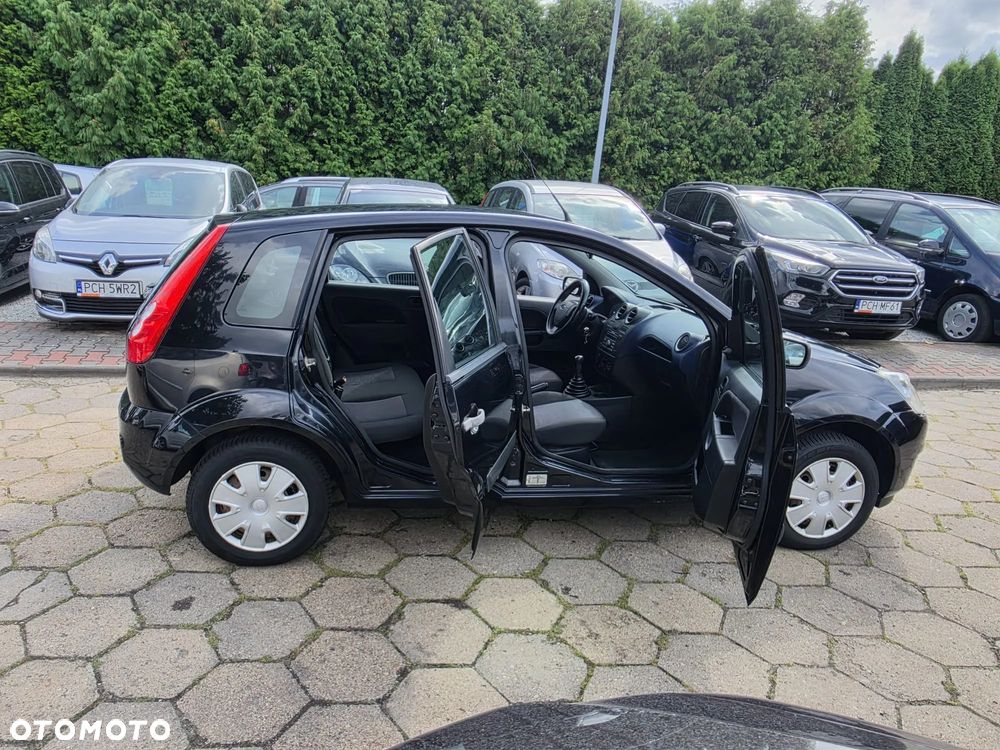 Ford Fiesta 1.4 Ghia - 10