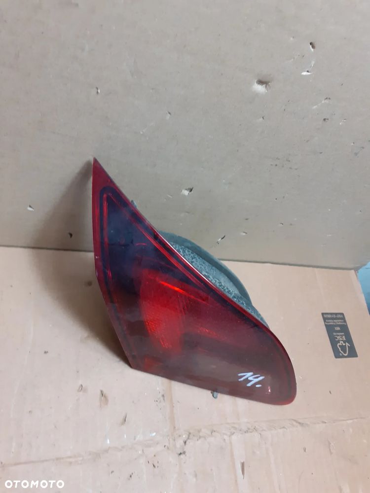 LAMPA TYLNA LEWA OPEL ASTRA J - 2