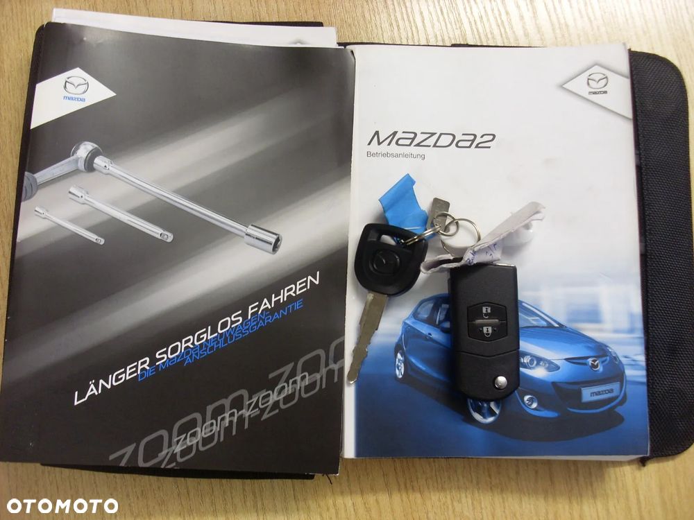 Mazda 2 1.3 Navi + - 14