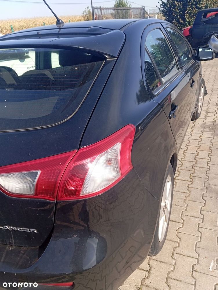 MITSUBISHI LANCER VIII SPORTBACK LAMPA PRAWA TYLNA W BŁOTNIK EU - 1