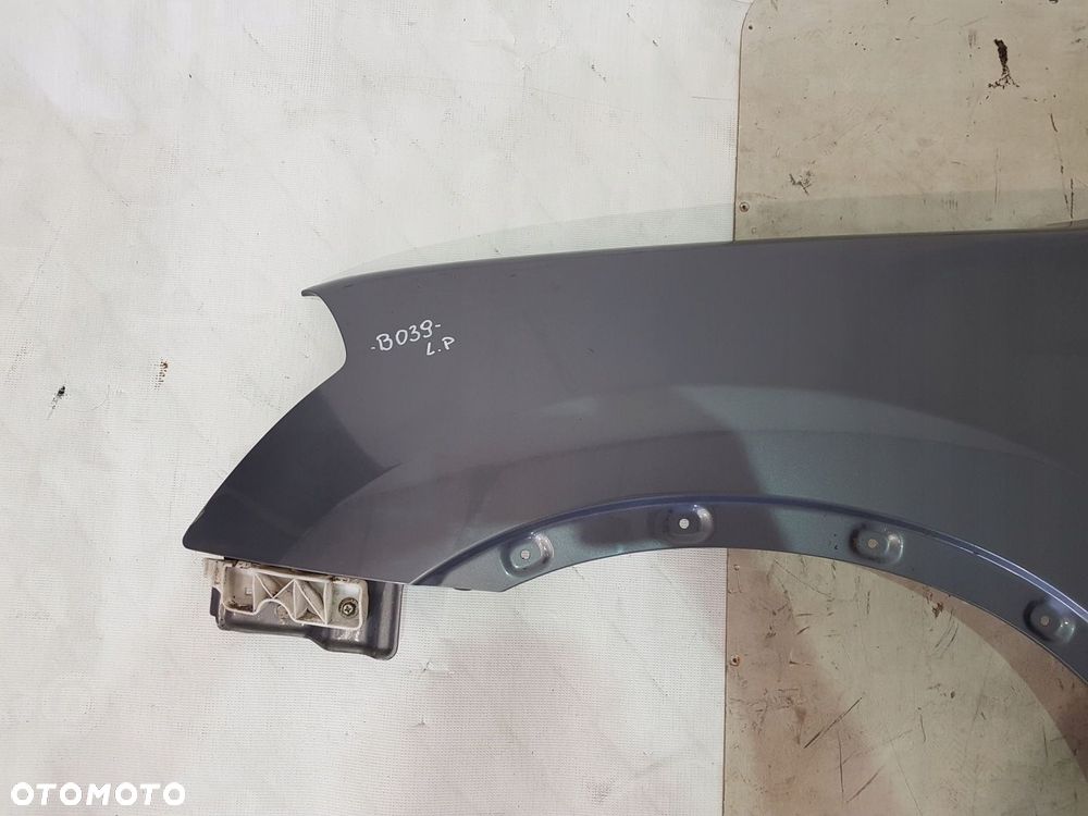 BŁOTNIK LEWY PRZÓD NISSAN QASHQAI J102 2.0 DCI 4X4 EUR 09R B52 - 2