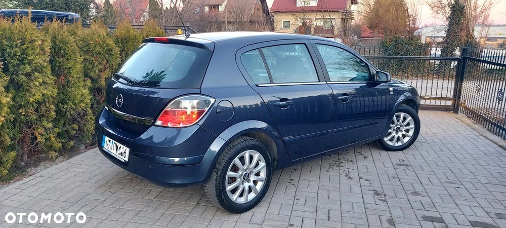 Opel Astra 1.8 Edition Plus - 12