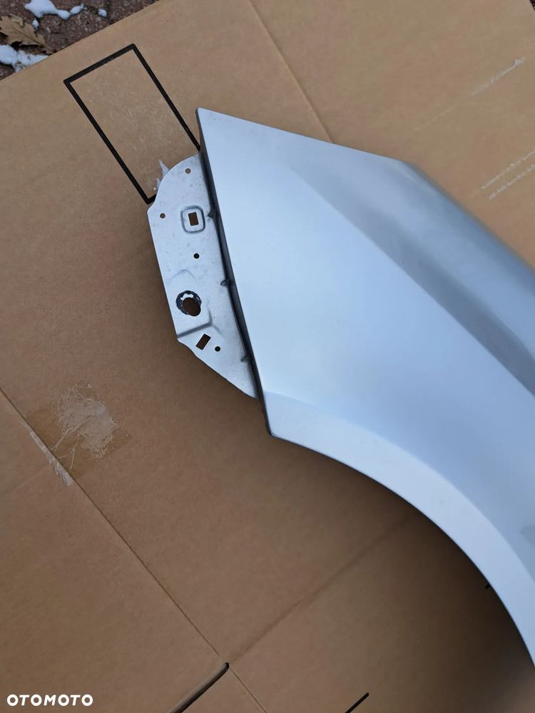 Błotnik przód lewy Opel Corsa D kod lakieru Z157 - 4