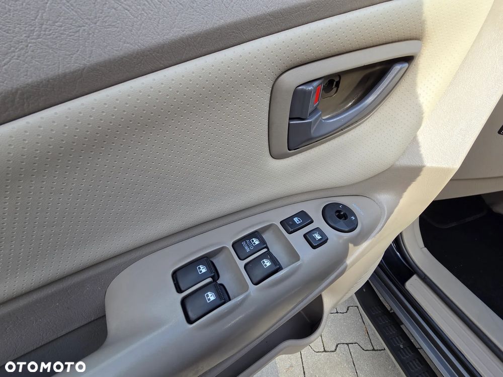 Hyundai Tucson 2.0 CRDi Elegance + - 12