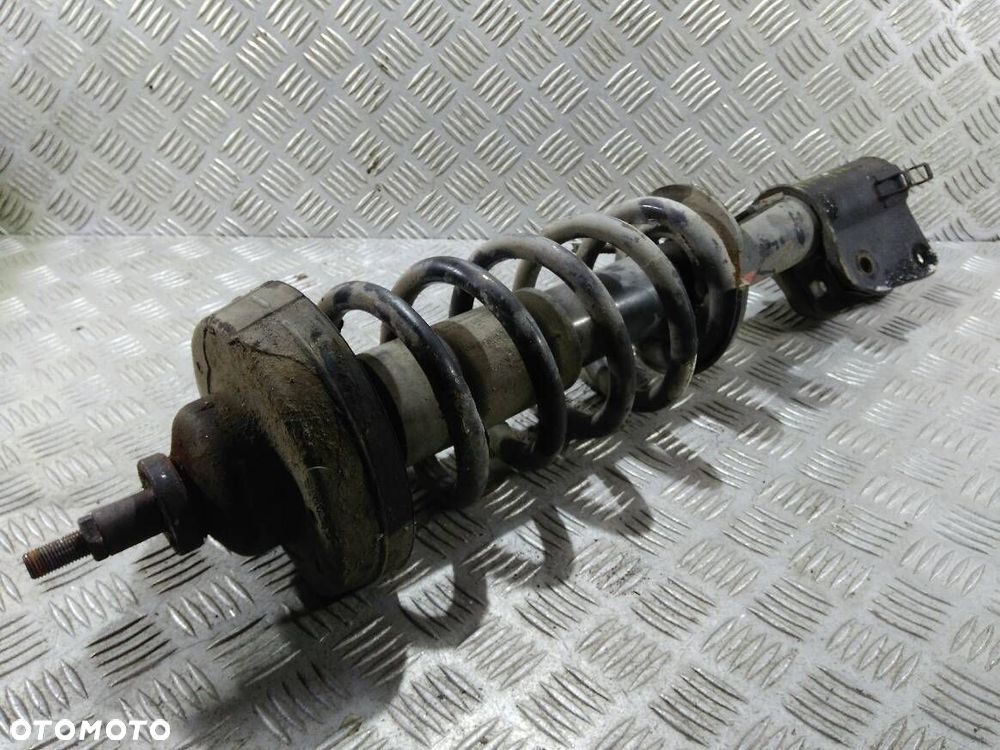 AMORTYZATOR PRAWY PRZEDNI SPRĘŻYNA RENAULT TRAFIC - 2