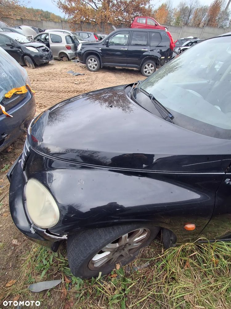 Chrysler pt cruiser blotnik lewy PX8 - 2