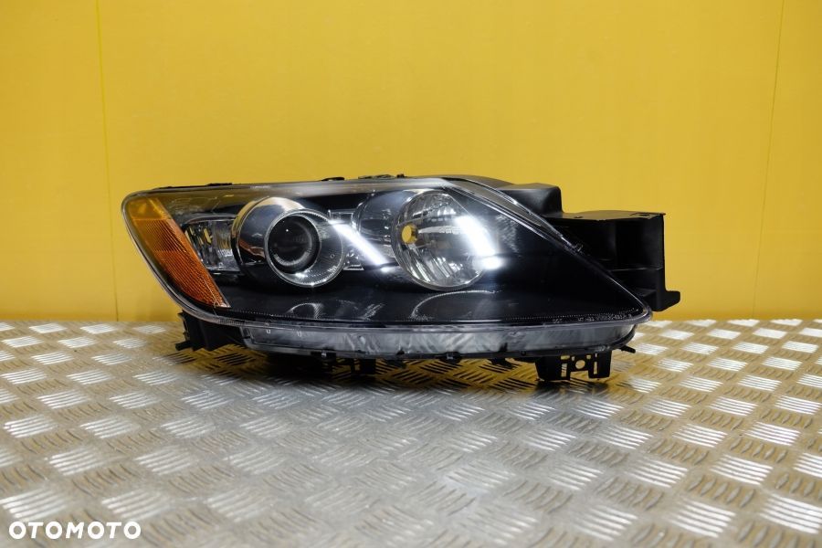 MAZDA CX-7 CX7 2006- REFLEKTOR LAMPA ZWYKŁA SOCZEWKOWA PRAWA USA - 1