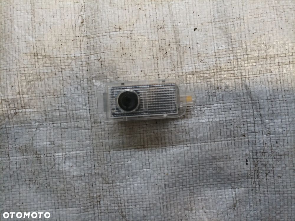 Skoda Octavia SuperB Kodiaq Karoq lampka z projektorem logo SKODA 5e3052133d