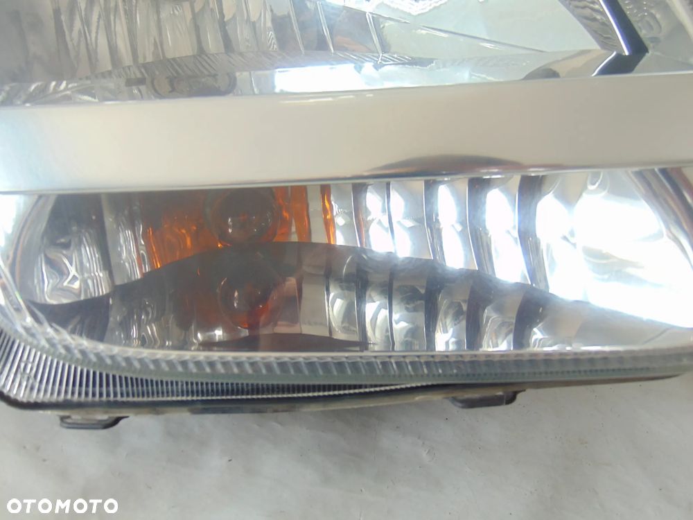 ORYGINAŁ lampa przednia przód prawa Suzuki Ignis 2 II 03-07r - 3