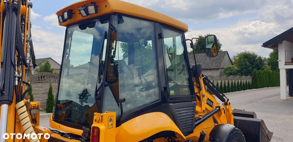 JCB 2CX tylko 2835mtg! z ROTOTILT / 3 łyżki /widły/centralne smarowanie/klimatyzacja / STAN IDEALNY !! - 25