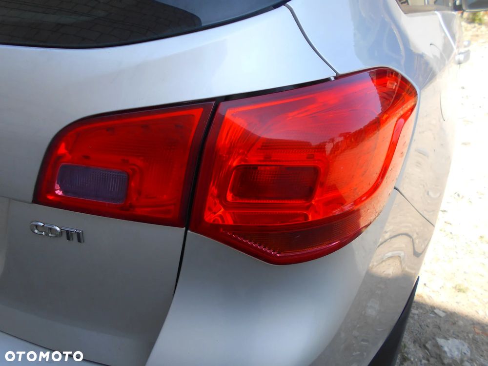 OPEL ASTRA J SPORT TOURER KOMBI KOD LAKIERU Z176 92KW-125KM  SILNIK SKRZYNIA BIEGOW MANUALNA 6 BIEGOWA MASKA LAMPA LUSTERKO PAS PRZEDNI BLOTNIK ZAWIESZENIE  ZDERZAK PRZOD SPRYSK SPRISKIWACZ LAMP SOCZEWKA CZESCI - 14
