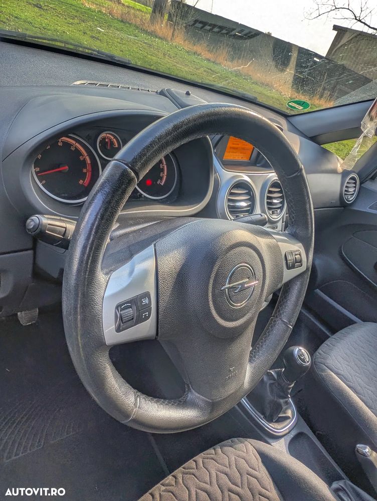 Opel Corsa 1.4 16V Active - 13