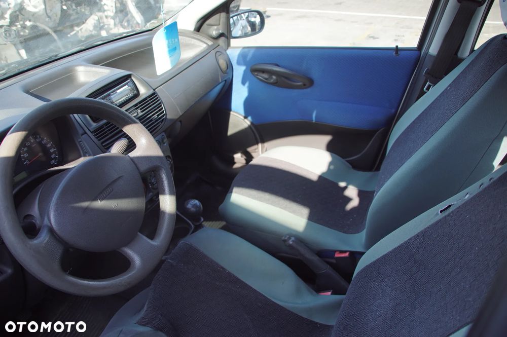 Auto na części - Fiat Punto II 1.2 8V 60 KM 188A4000 2003R Silnik Skrzynia Drzwi Maska Klapa Zderzak Błotnik Szyba Lusterko Deska Kokpit Sterownik Moduł Licznik Kierownica - 9