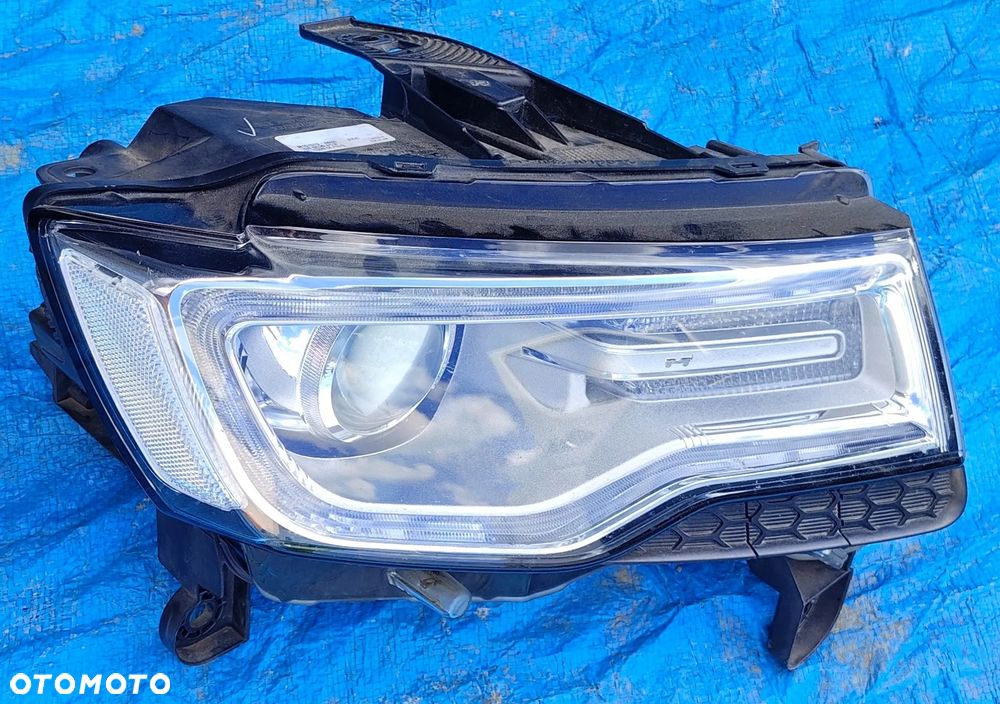 Oryginalna Lampa Reflektor Kompletny Przód Przedni Prawy RH Bixenon Skrętny AFS M167613 Jeep Grand Cherokee WK2 Lift 2014- - 2