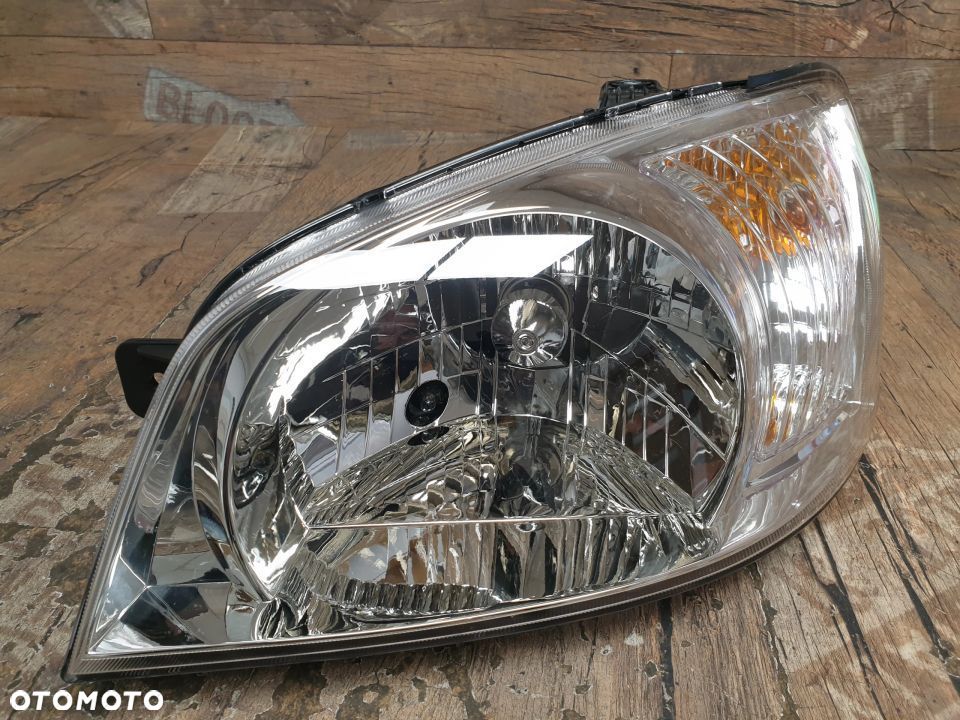Oryginalna lampa lewa reflektor Hyundai Getz 92110-1C010 - 2