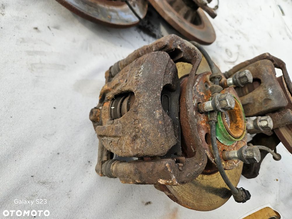 Zwrotnica piasta lewa prawa przód przednia zacisk jarzmo tarcza czujnik ABS Opel Corsa C 1,0 12V 9156140 9156141 - 2