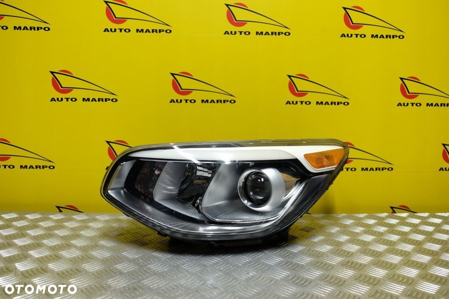 KIA SOUL II 2014- REFLEKTOR LAMPA PRZÓD ZWYKŁA SOCZEWKOWA LEWA USA - 2