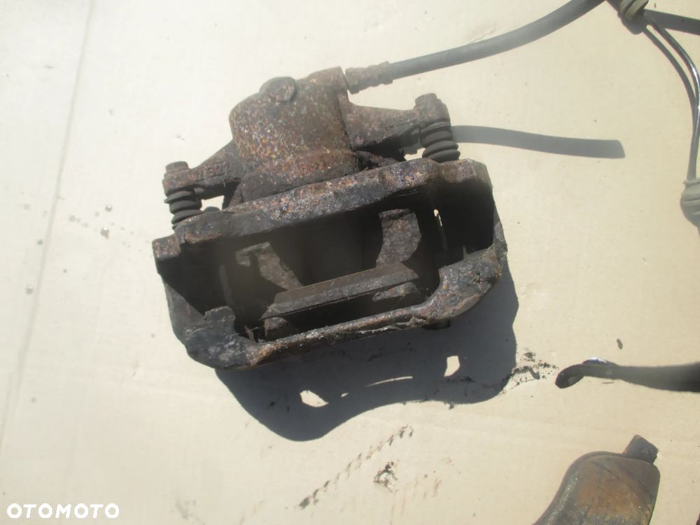 Macperson Zacisk tarcza piasa Fiat Dolbo II Combo D 1.3 - 6