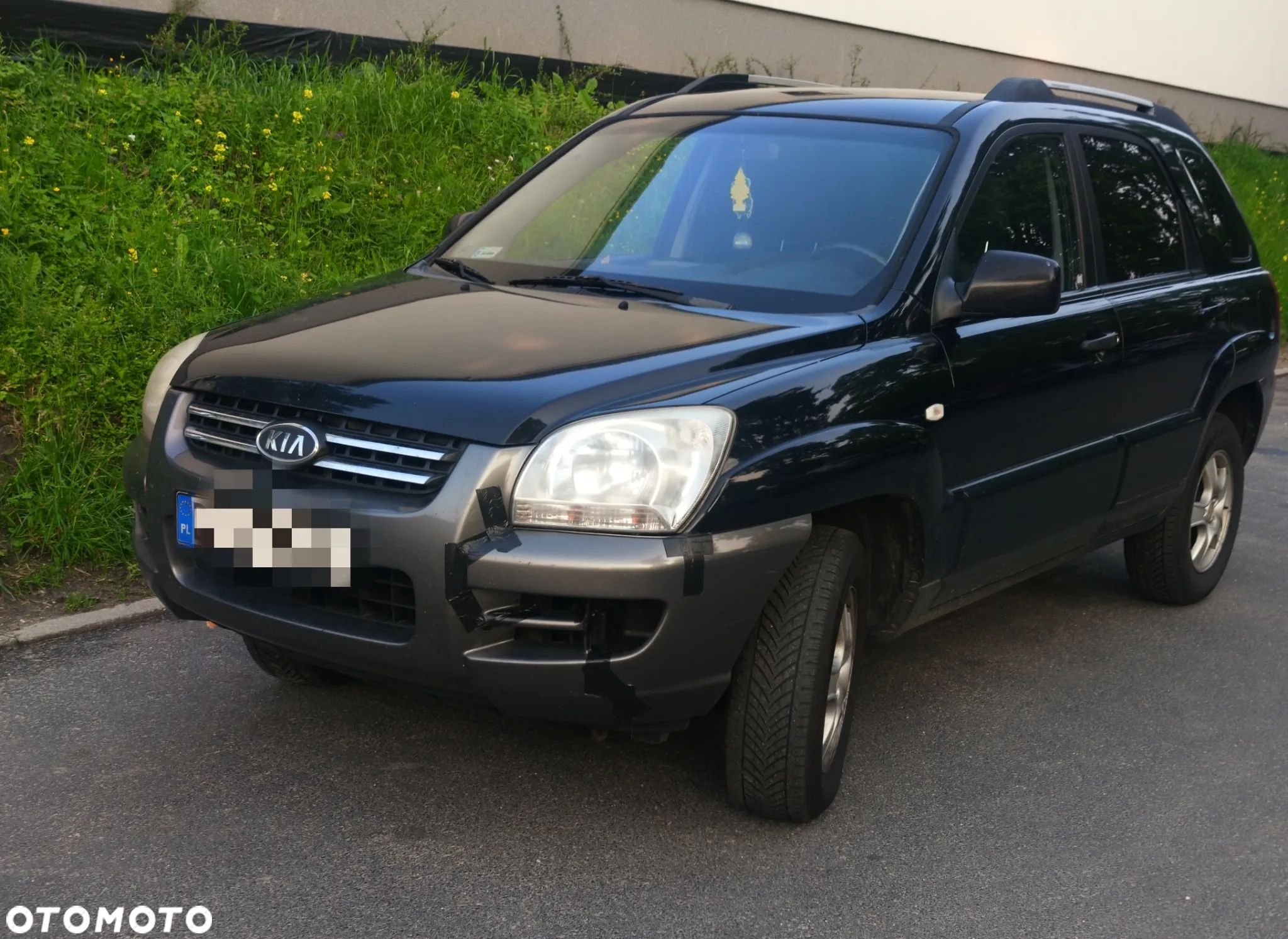 Kia Sportage - 1