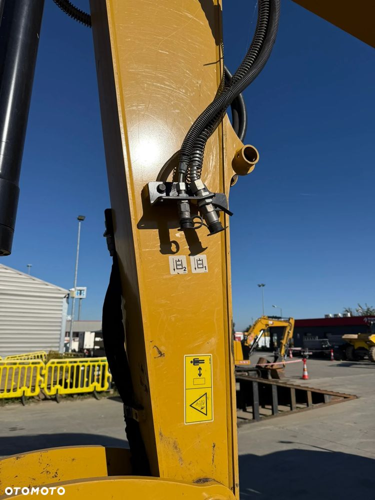 Caterpillar 310 - 16