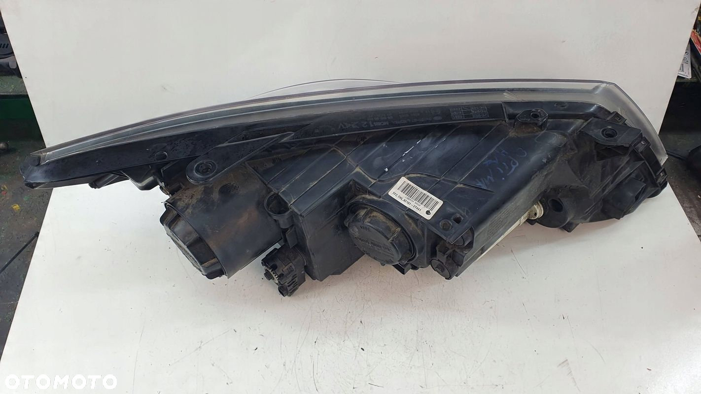 KIA Optima 3 III 10- lewa lampa przednia przód reflektor € - 7