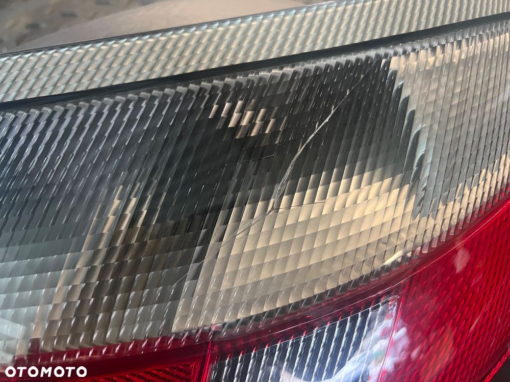 PORSCHE CARRERA 996 LAMPA PRAWY TYŁ PRAWA TYLNA NOWA Z PĘKNIĘCIEM SZARA CIEMNA EUROPA ORYGINAŁ - 2