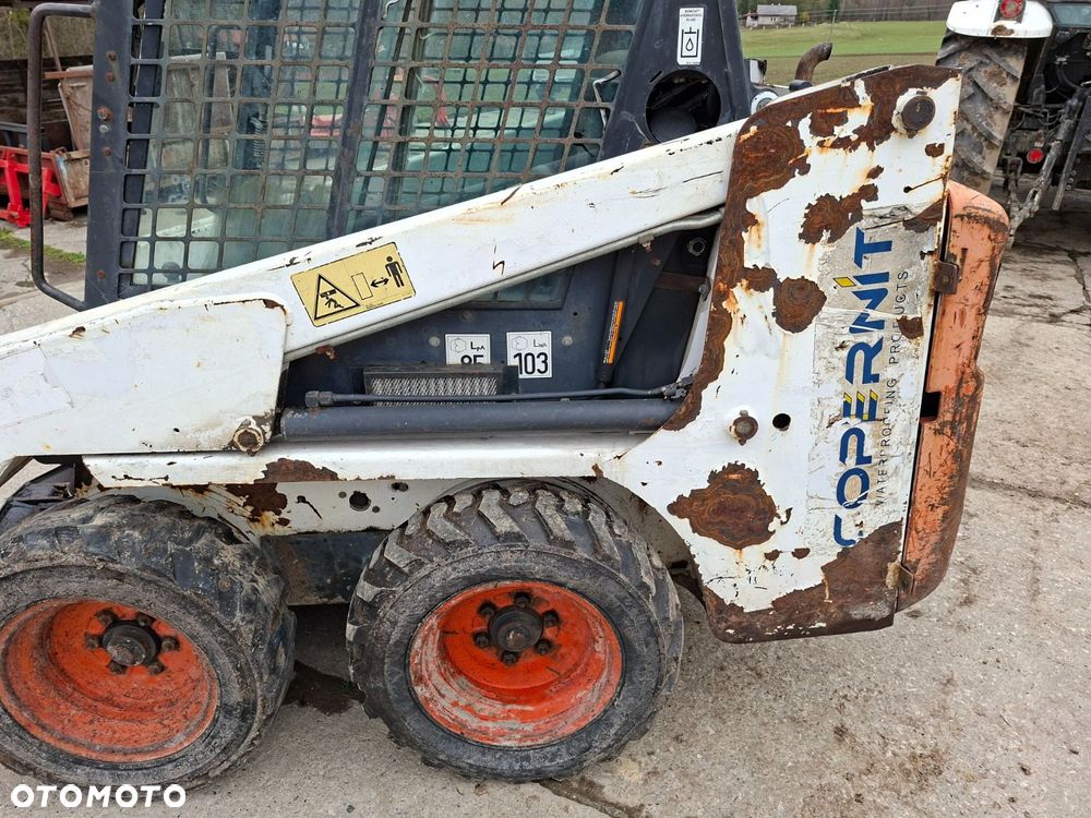 Bobcat 553 4X4 + Melroe Ingersoll-Rand 725S B/H - 33